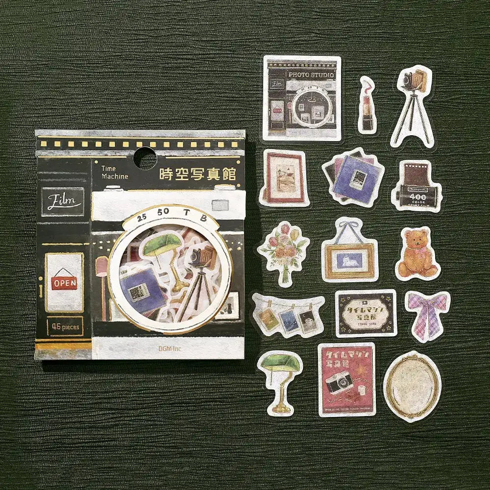 Förpackning med klistermärken. Stickers utspridda. Film och kort. Flake stickers - Fantasy Shopping Arcade - Time and Space Photo Gallery från BGM - Tidformera
