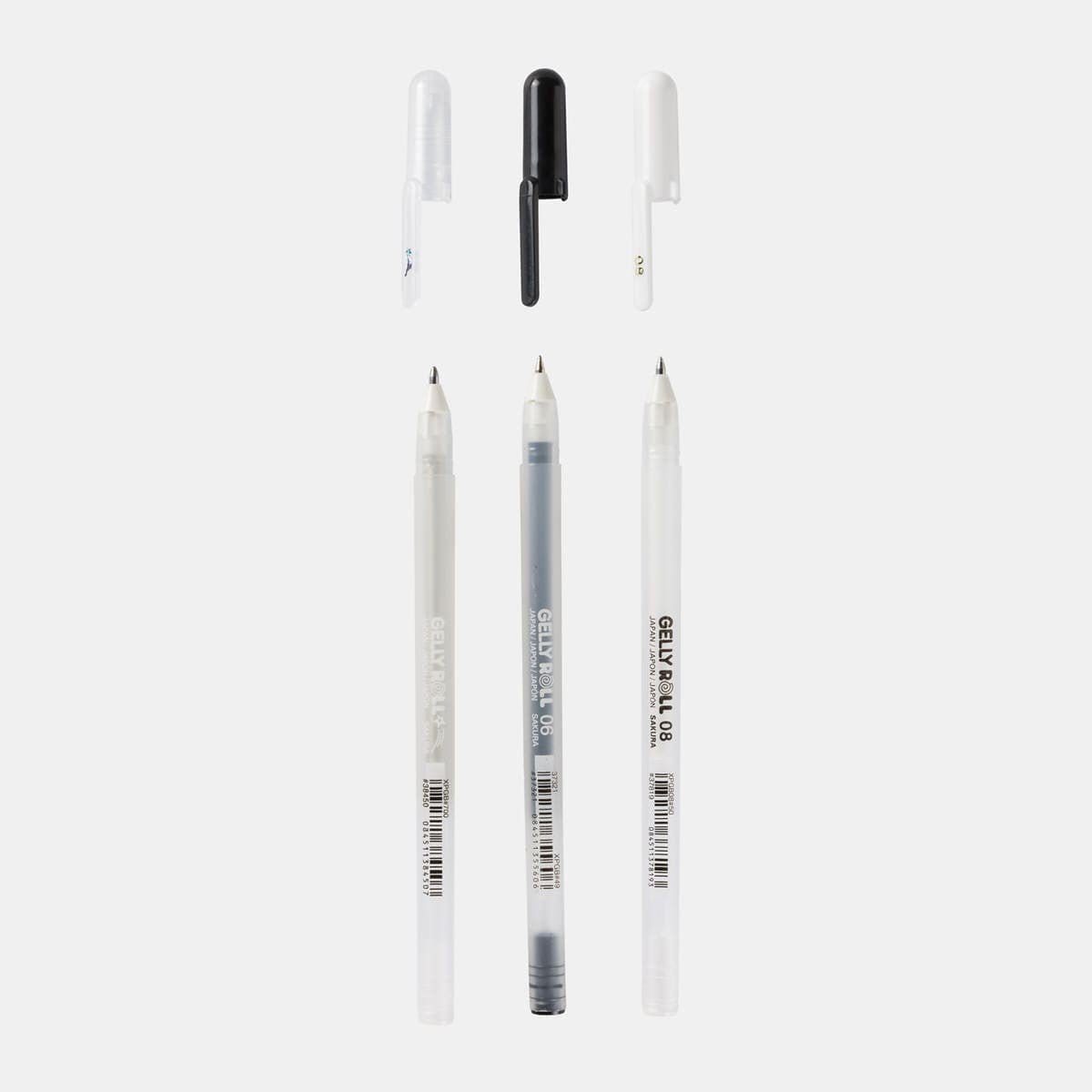 Gelly roll Gelpenna 3 - pack - Basic från Sakura. Tre pennor med avtagna lock. Pennorna har färgerna silver, svart och vitt. - Tidformera