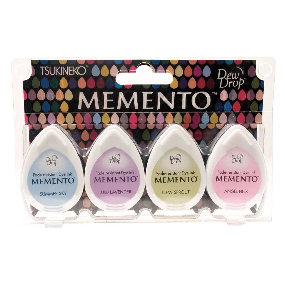 Stämpeldyna Memento Dew Drop - Oh Baby från Tsukineko. 4 ljusa färger på stämpeldynor i denna förpacknig. Blå, lavendel, grön och rosa. - Tidformera