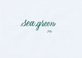 Handskriven text med orden "sea green" i havsgrön färg, skriven med ABT Dual Brush Pen i nyansen 346 Sea Green.