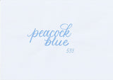 Handskriven text med ordet "peacock blue" i blå färg, skriven med ABT Dual Brush Pen i nyansen 533 Peacock Blue.