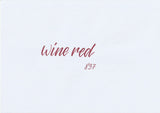Handskriven text med orden "wine red" i vinröd färg, skriven med ABT Dual Brush Pen i nyansen 837 Wine Red.