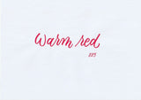 Handskriven text med orden "warm red" i varm röd färg, skriven med ABT Dual Brush Pen i nyansen 885 Warm Red.