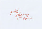 Handskriven text med orden "pale cherry" i blek körsbärsfärg, skriven med ABT Dual Brush Pen i nyansen 912 Pale Cherry.