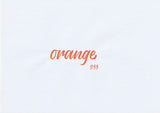 Handskriven text med ordet "orange" i orange färg, skriven med ABT Dual Brush Pen i nyansen 933 Orange.