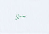 Handskriven text med ordet "Green" i grön färg, skrivet med Pentel Brush Sign Pen i färgen Green.