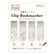 Förpackning med fyra bokmärken med olika motiv med blommor. Clip Bookmarker - Flower från Midori.