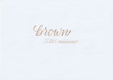 Handskriven text med orden "brown" och "ZEBRA mildliner" i brun färg, skriven med Zebra Mildliner Brush Pen i färgen Brown.