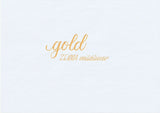 Handskriven text med orden "gold" och "ZEBRA mildliner" i guld färg, skriven med Zebra Mildliner Brush Pen i färgen Gold.
