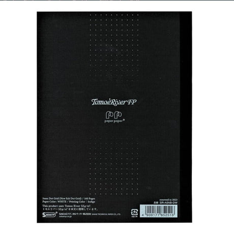 TomoeRiver Notebook softcover - A5 - Dot Grid från Sakae TP. Baksidan på skrivboek och där finns tryck med prickar. På står TomoeRiver FP - Tidformera